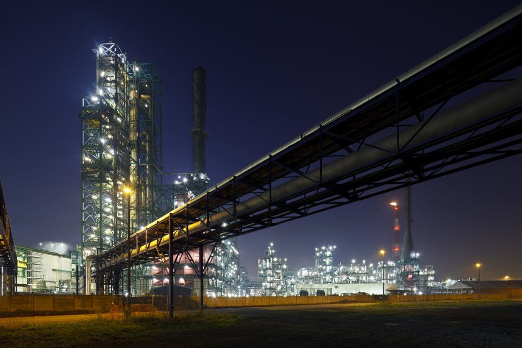 Pipelines And Refinery At Night