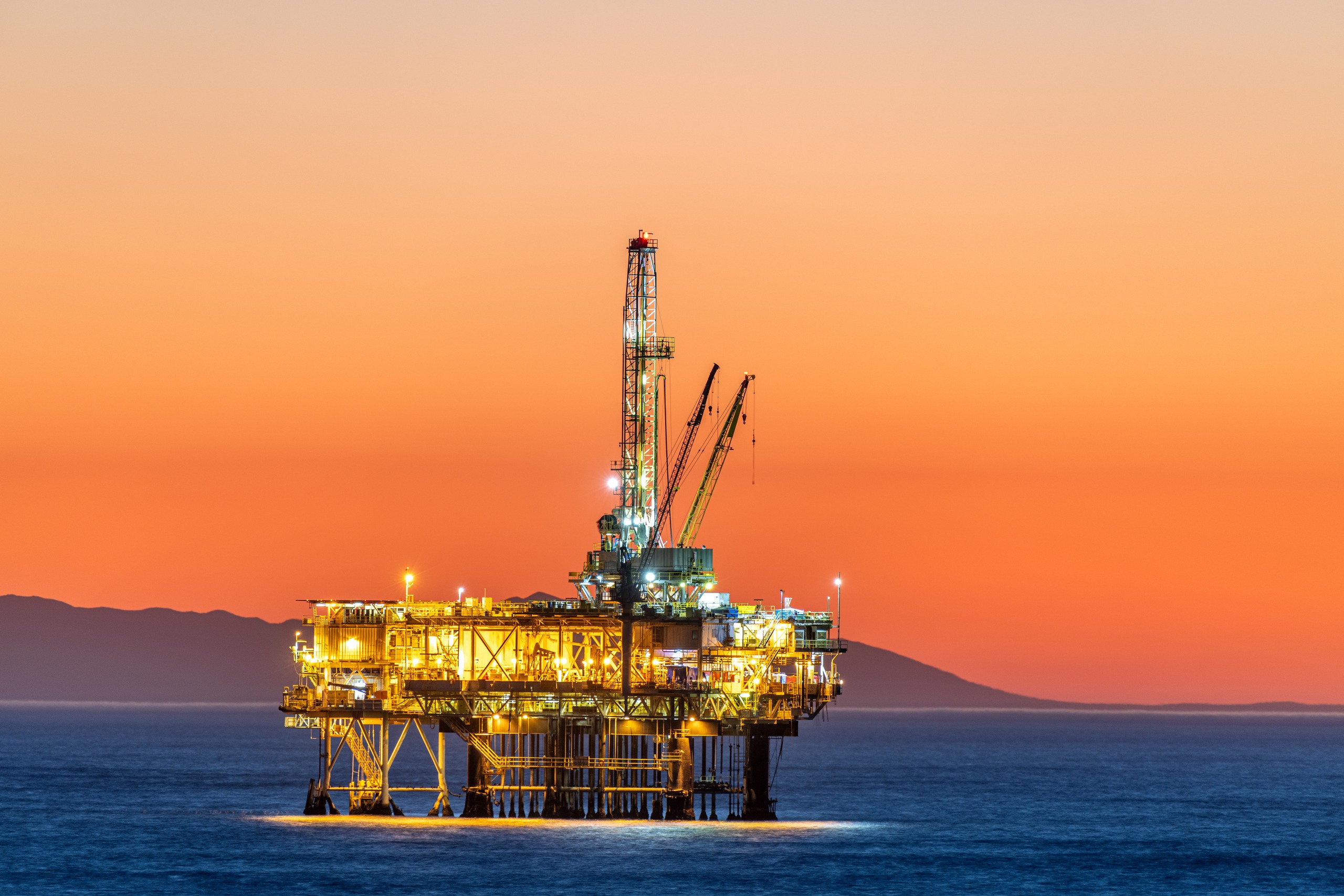 Offshore oil platform at dusk