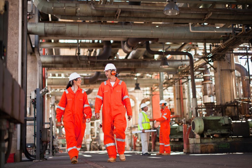 workers-walking-at-oil-refinery