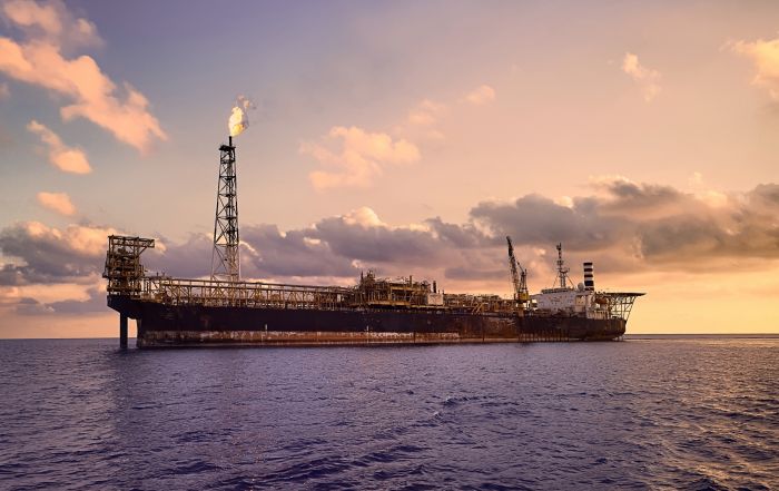 FPSO or floating product storage and offload at sea during sunset