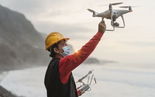 male-engineer-doing-inspection-using-drone