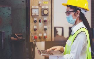 Industrial factory maintenance engineers woman inspect relay protection system of machinery and holding notebook with copy space. Industry, Maintenance, Engineering and construction