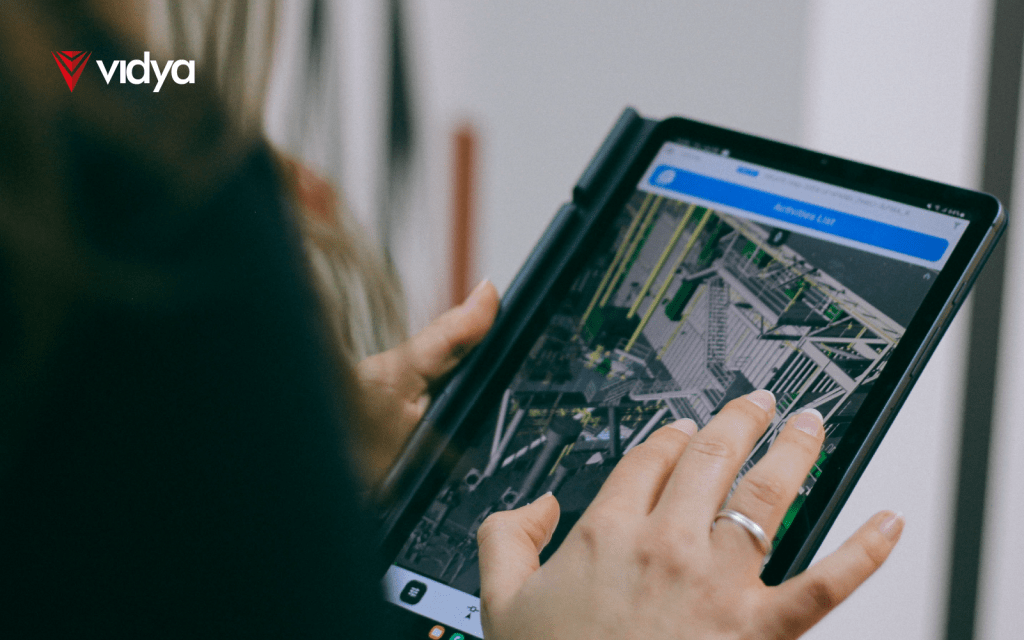 Image of a woman using Vidya System Platforms [VSP] on a tablet.