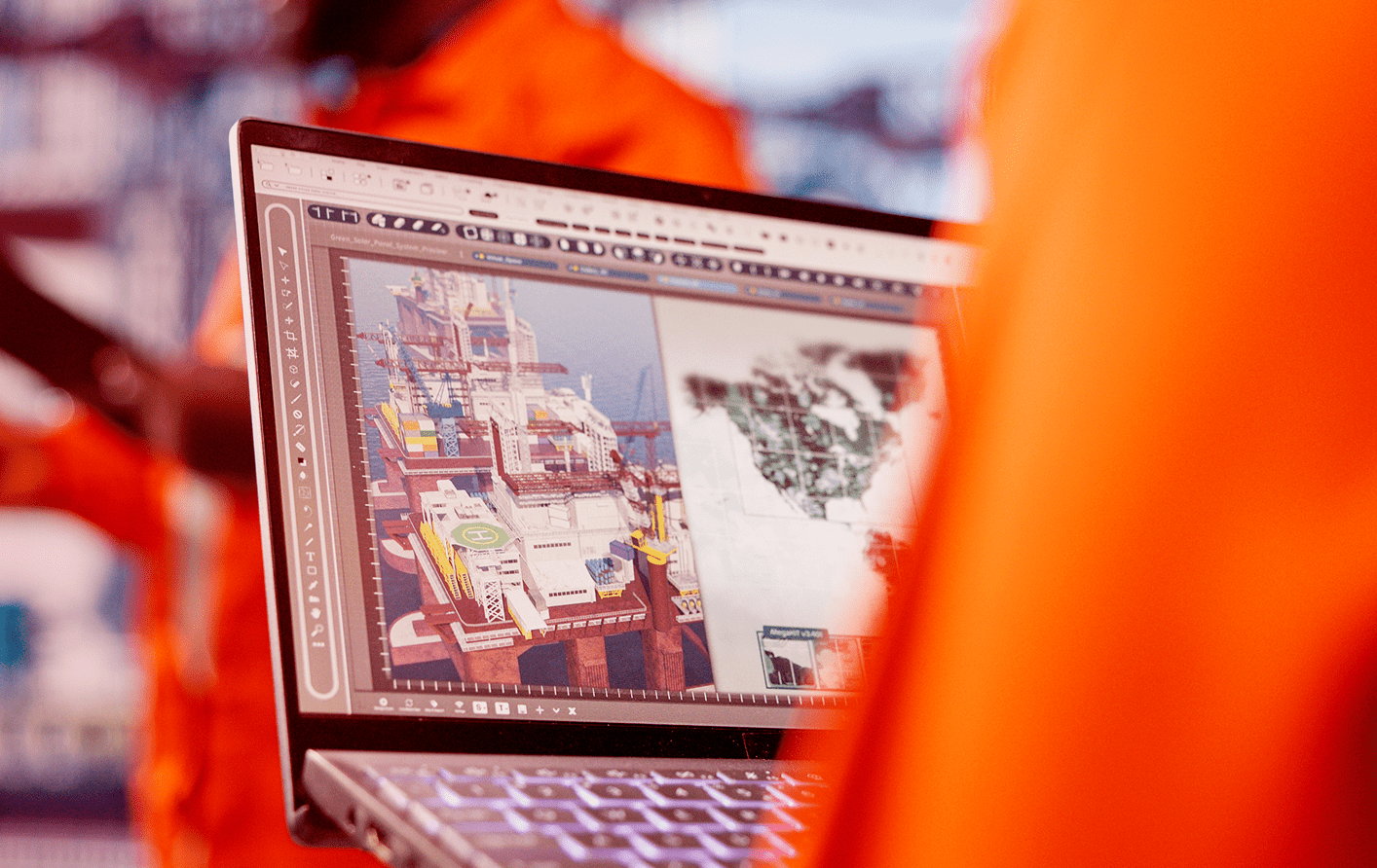 Engineer looking at digital twin in a desktop